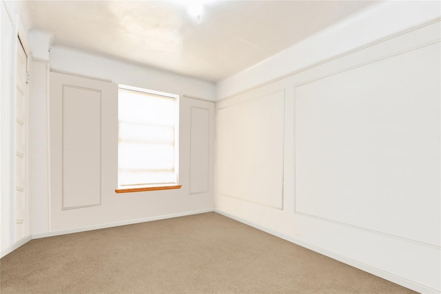 view of carpeted spare room