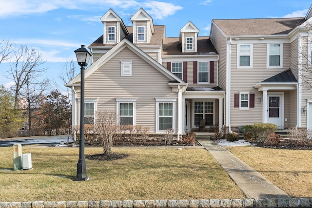 view of front of home with a front lawn