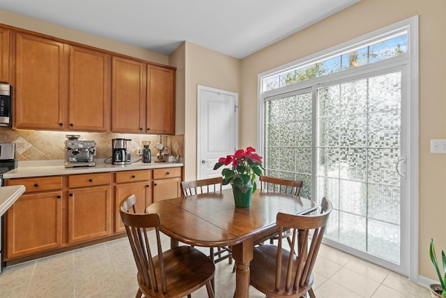 view of tiled dining space