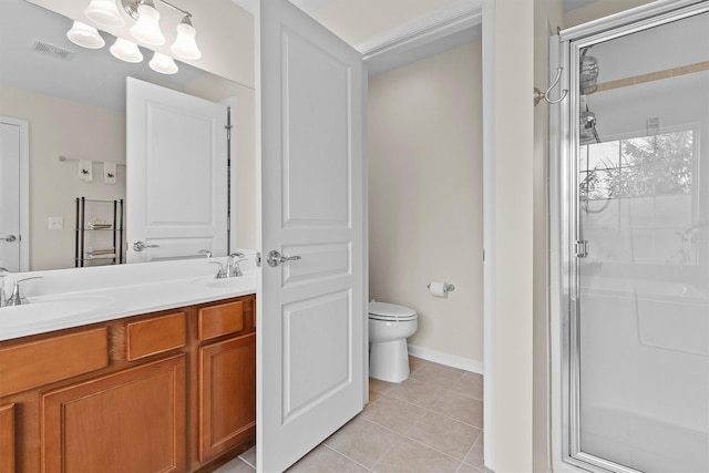 bathroom with toilet, tile patterned floors, an enclosed shower, and vanity