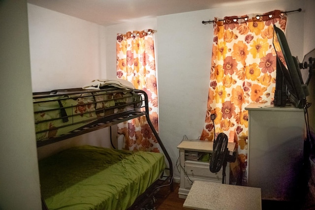 bedroom featuring wood-type flooring