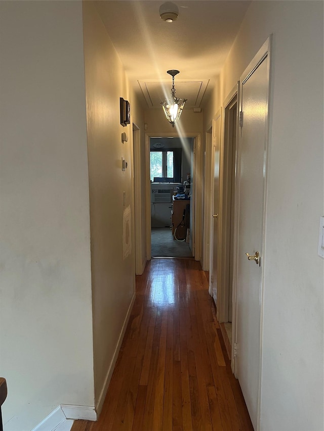 hallway featuring dark hardwood / wood-style floors