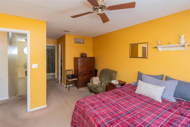 bedroom with ceiling fan and carpet floors