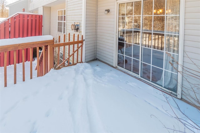 view of snow covered deck