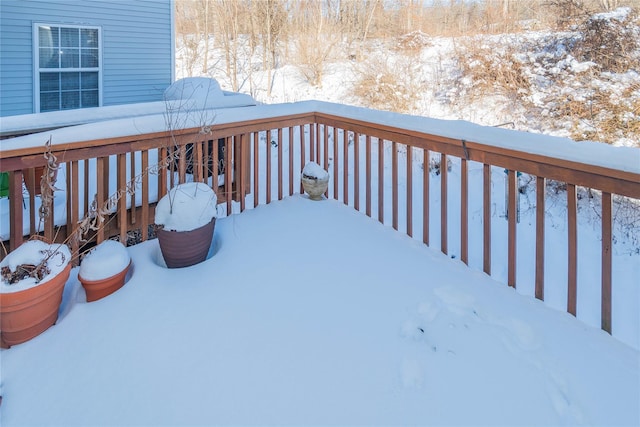 view of snow covered deck