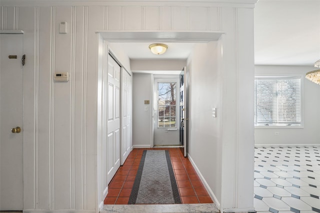 entryway with tile patterned floors