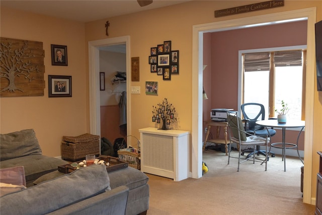 living room with light colored carpet