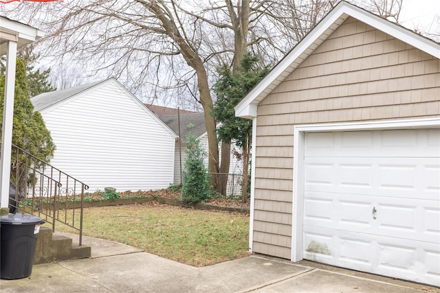 garage with a lawn