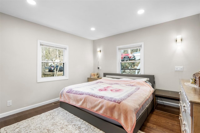 bedroom featuring dark wood-type flooring