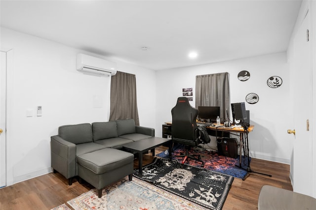 living room featuring hardwood / wood-style flooring and a wall mounted air conditioner