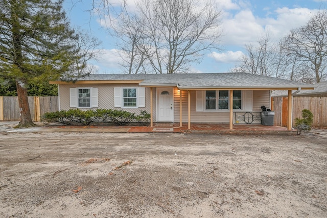 ranch-style house featuring a porch