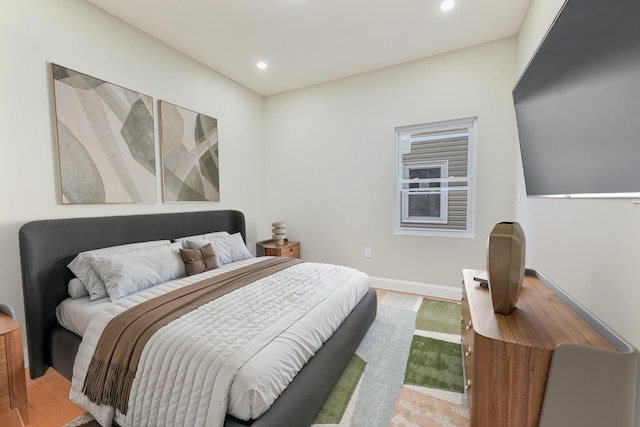 bedroom featuring hardwood / wood-style flooring