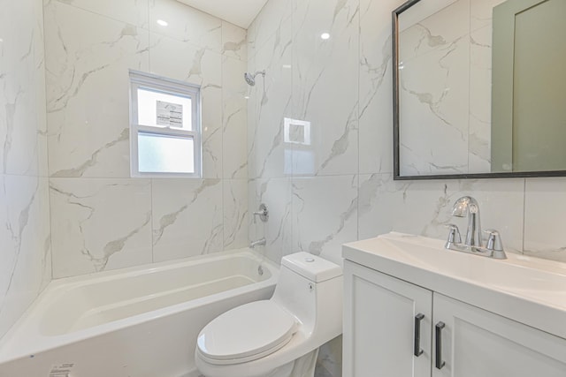 full bathroom featuring toilet, tile walls, tiled shower / bath, and vanity