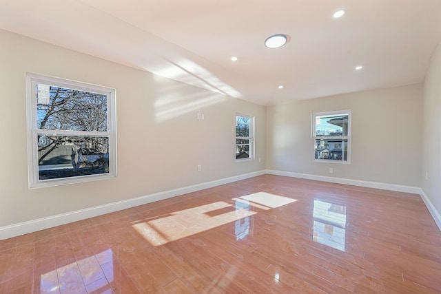 unfurnished room featuring light hardwood / wood-style flooring