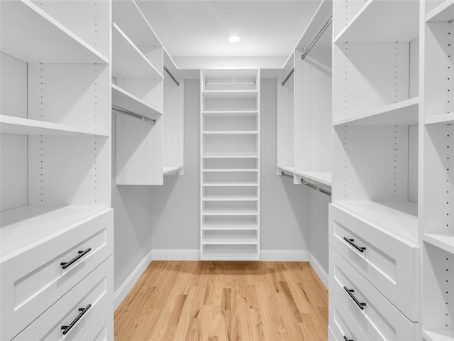 spacious closet with light wood-type flooring