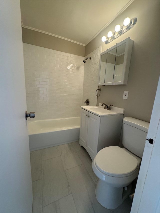 full bathroom with tiled shower / bath combo, vanity, crown molding, and toilet