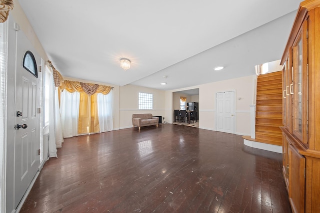 foyer with dark wood-type flooring