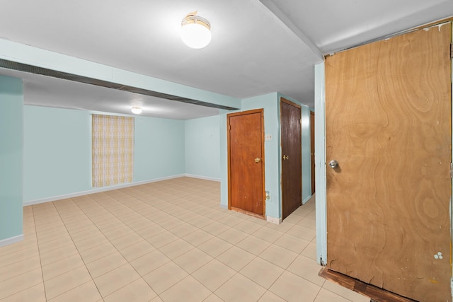 basement with light tile patterned floors