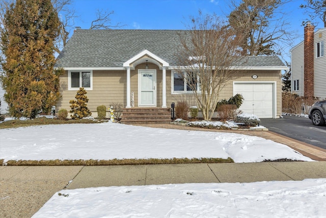 view of front of home featuring a garage