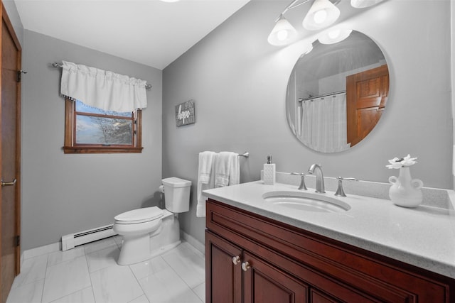 bathroom featuring vanity, toilet, a baseboard heating unit, and tile patterned floors