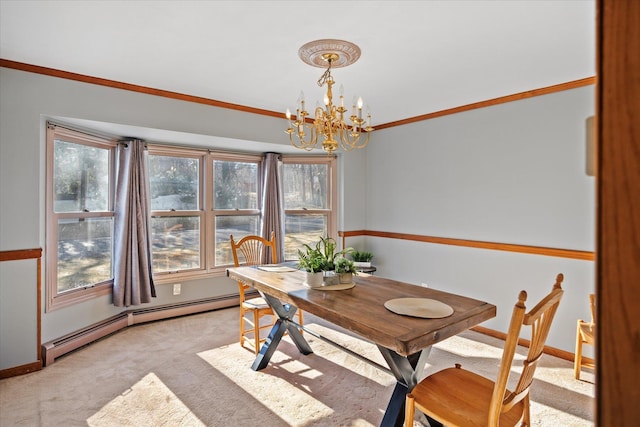 dining room featuring light carpet, baseboard heating, crown molding, and an inviting chandelier