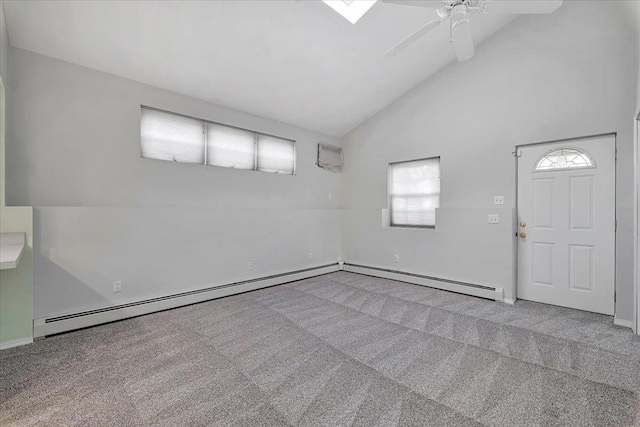 interior space featuring vaulted ceiling, ceiling fan, and a baseboard radiator