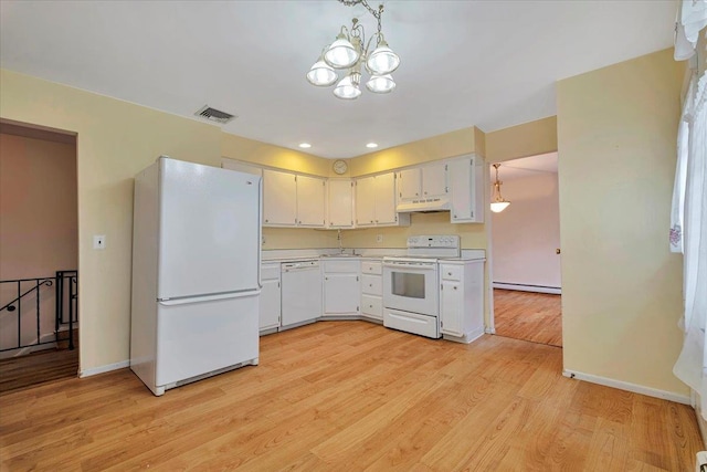 kitchen with baseboard heating, white appliances, light hardwood / wood-style floors, hanging light fixtures, and a notable chandelier