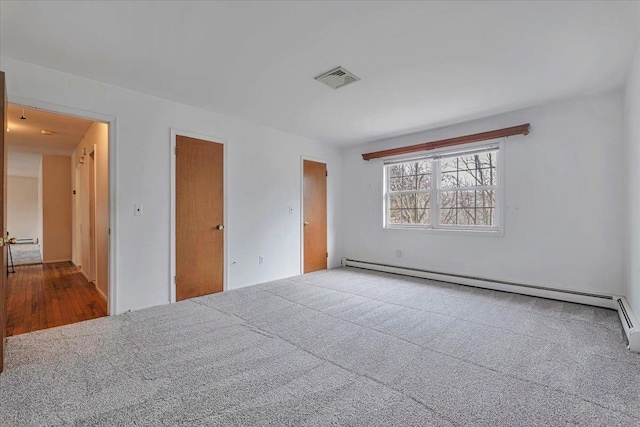 empty room with a baseboard radiator