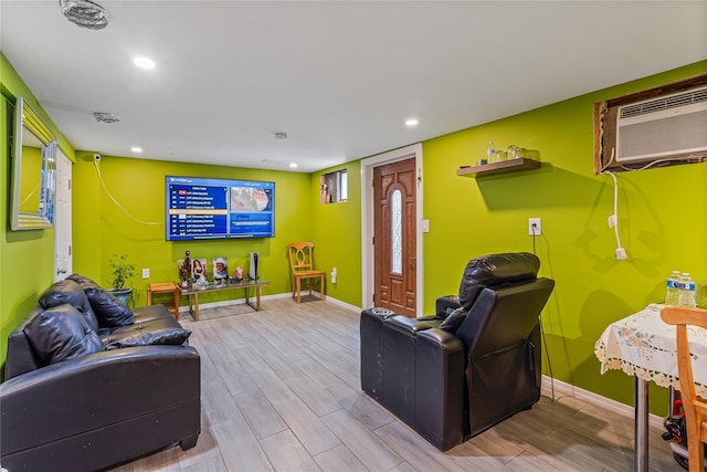 living room with a wall mounted air conditioner