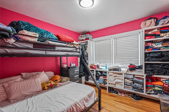 bedroom featuring hardwood / wood-style floors