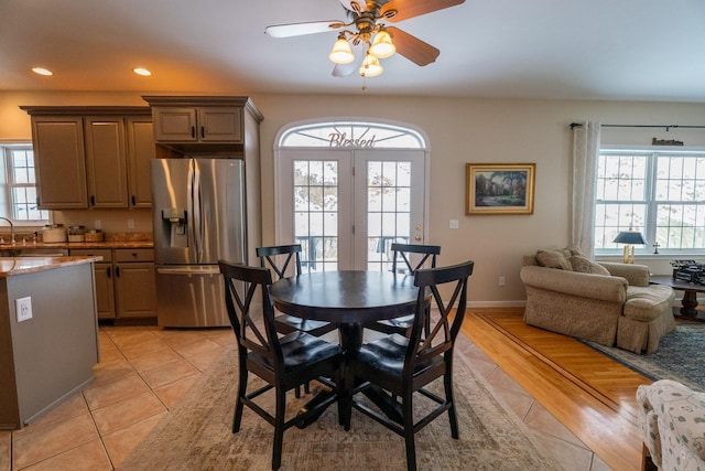 dining space featuring recessed lighting, baseboards, a ceiling fan, and light tile patterned floors