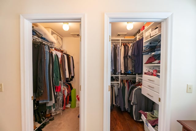 spacious closet featuring visible vents