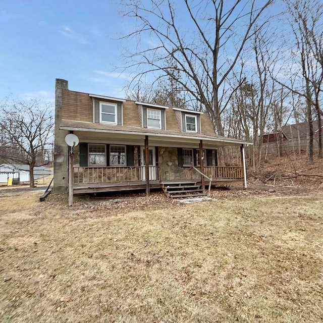 view of front of home featuring a porch and a front yard