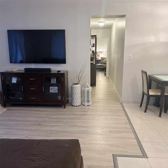 living room with light hardwood / wood-style flooring