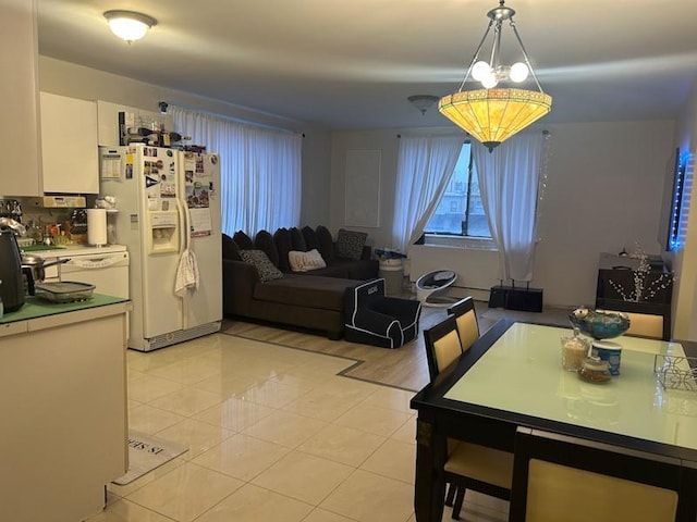 dining room with light tile patterned flooring