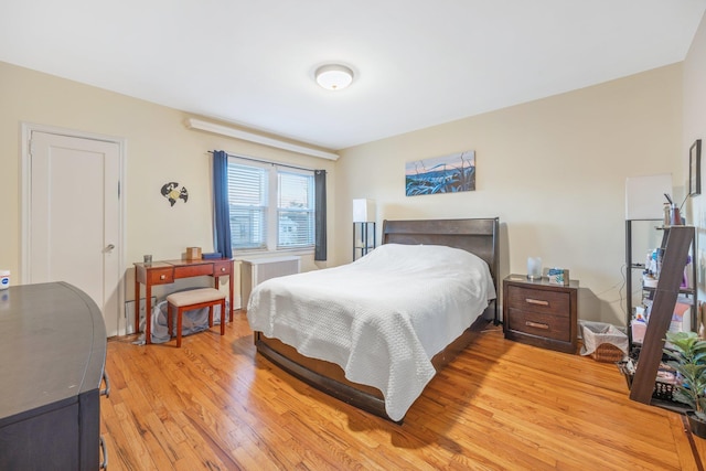 bedroom featuring light wood-type flooring