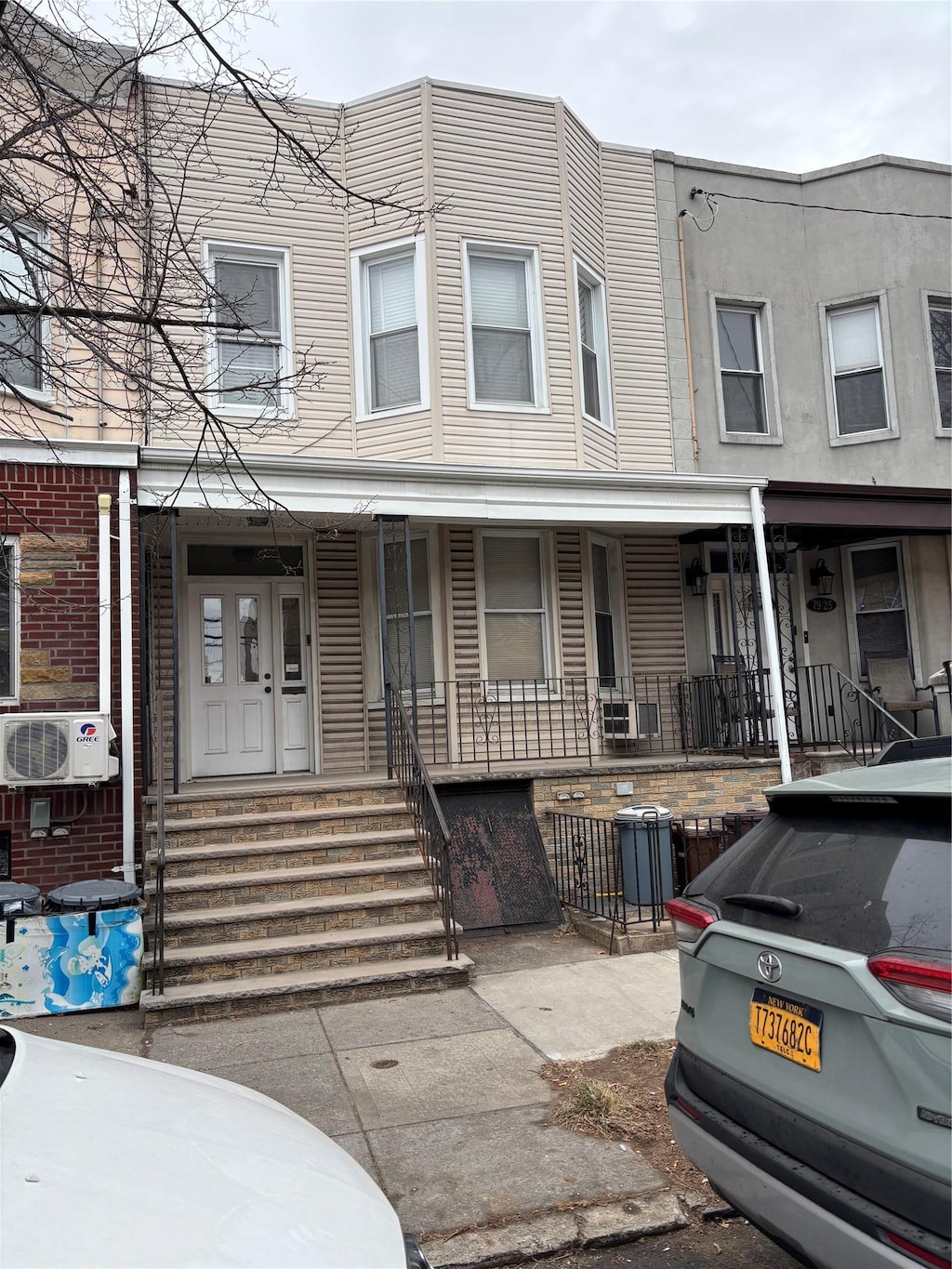 multi unit property featuring covered porch