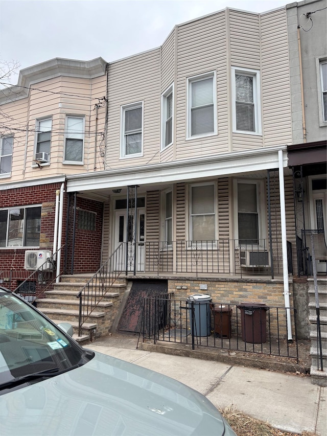 view of property with covered porch