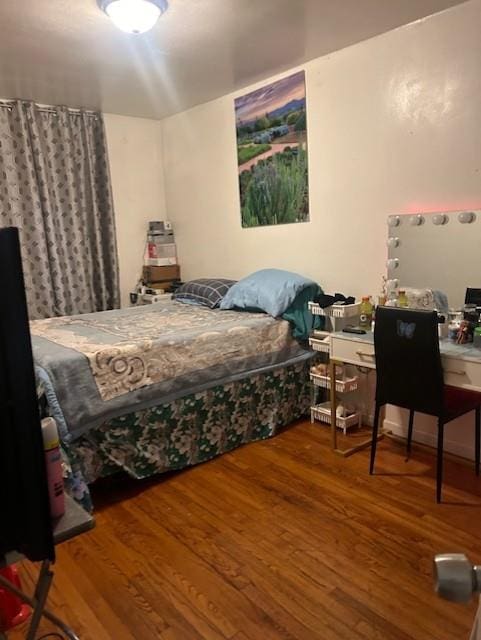 bedroom featuring hardwood / wood-style flooring