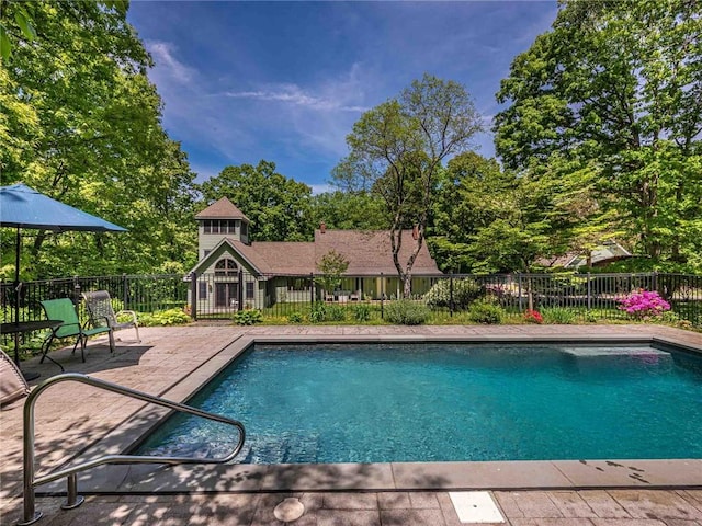 view of pool featuring a patio area