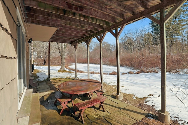 view of snow covered patio