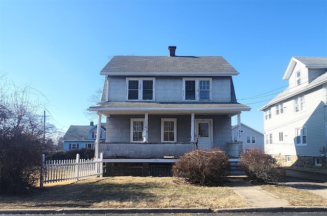 view of front property featuring a porch