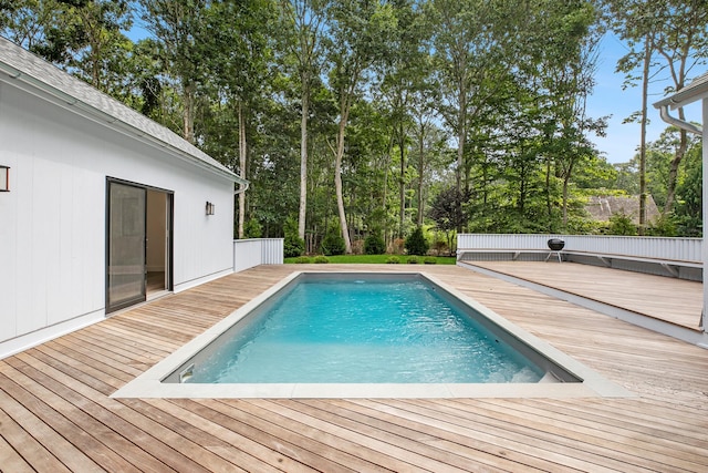 view of pool featuring a wooden deck