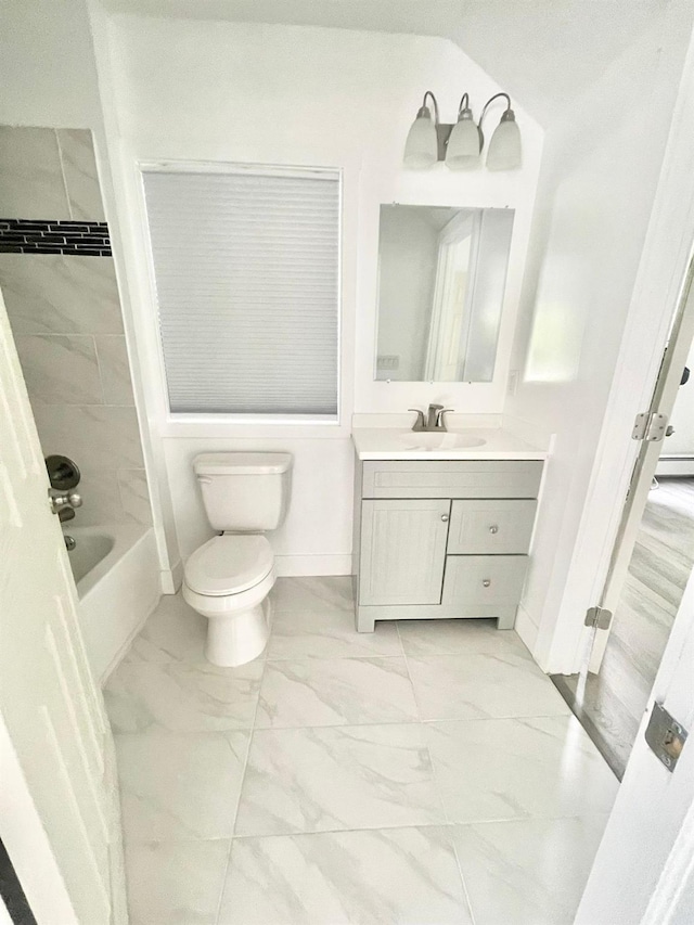 full bathroom with washtub / shower combination, vanity, and toilet