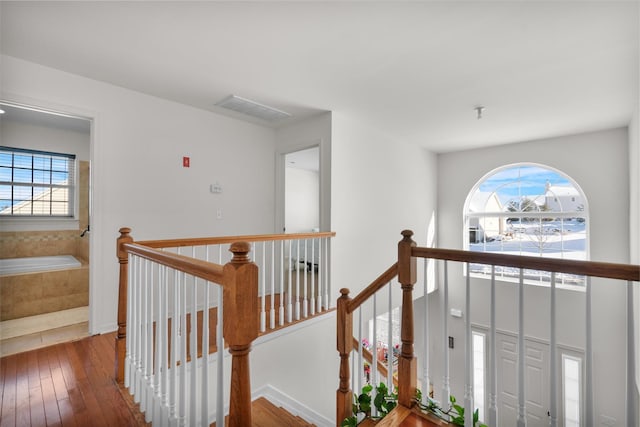 hallway featuring hardwood / wood-style floors