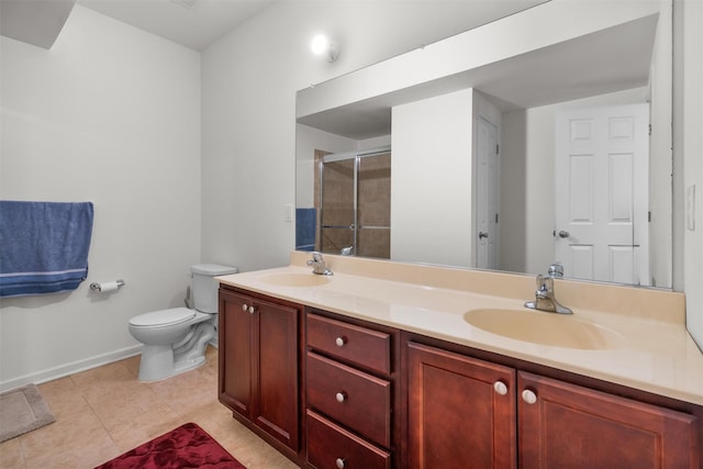 bathroom featuring vanity, toilet, tile patterned floors, and a shower with door