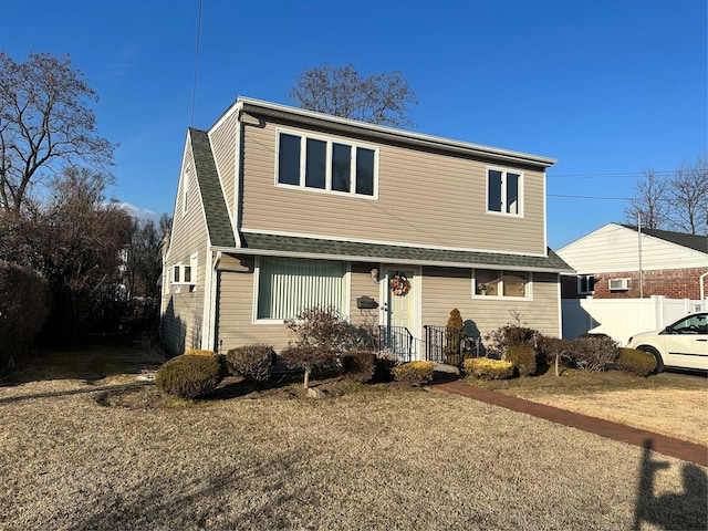 view of front of home featuring cooling unit