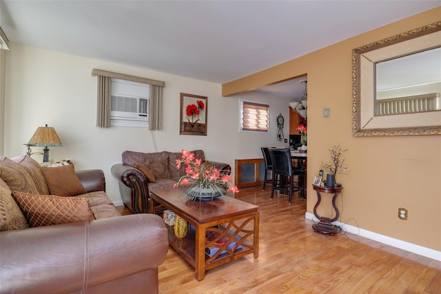 living room with light hardwood / wood-style floors