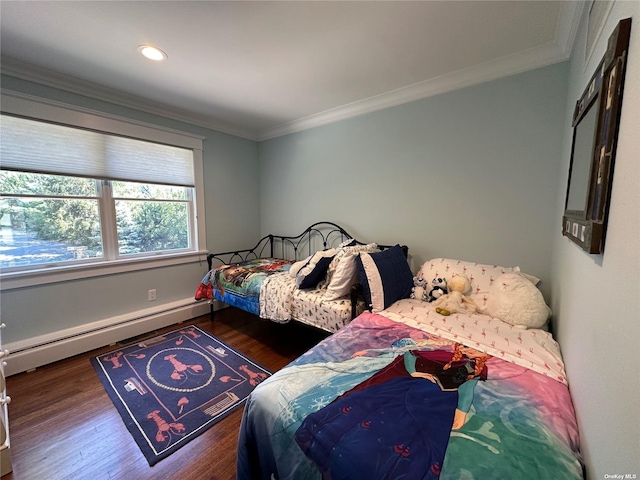 bedroom featuring crown molding, baseboard heating, and dark wood-type flooring