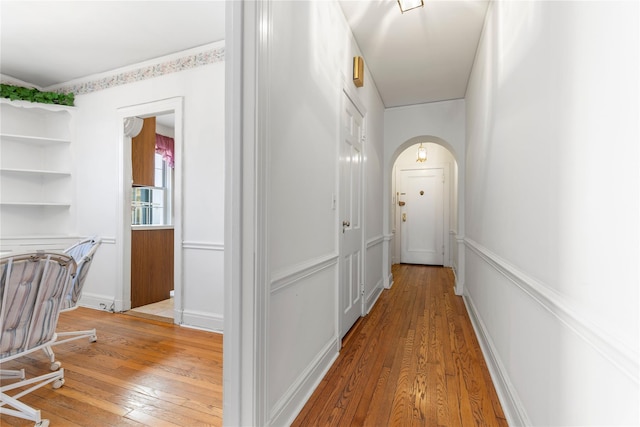 hallway featuring light hardwood / wood-style flooring